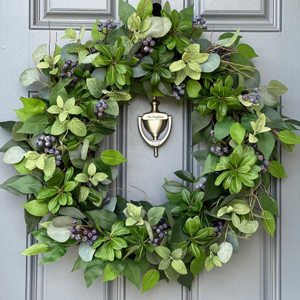 Evergreen and blueberry wreath