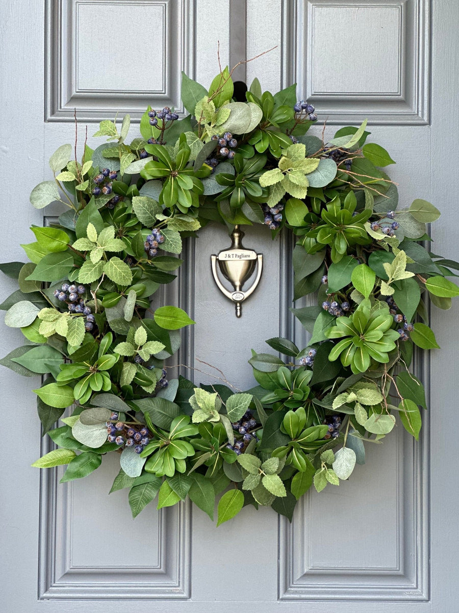 Evergreen and blueberry wreath