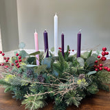 Picture of the listed Advent Wreath with red berries, pinecones and candles