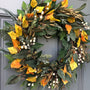 Fall eucalyptus greenery wreath with birch leaves, seeded pods and pussy willow.