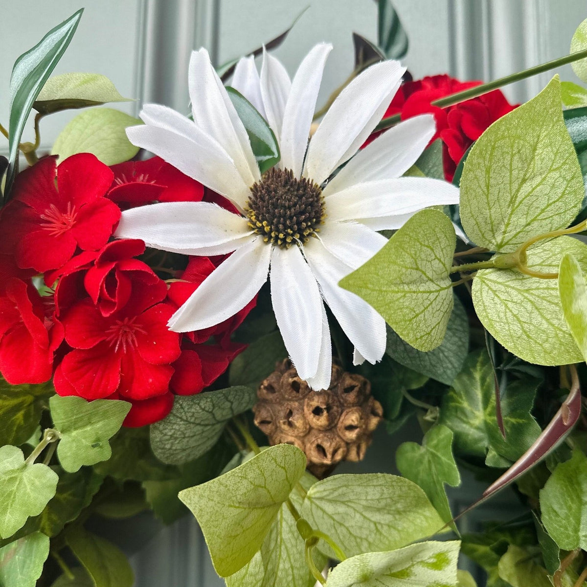 Front door geranium wreath