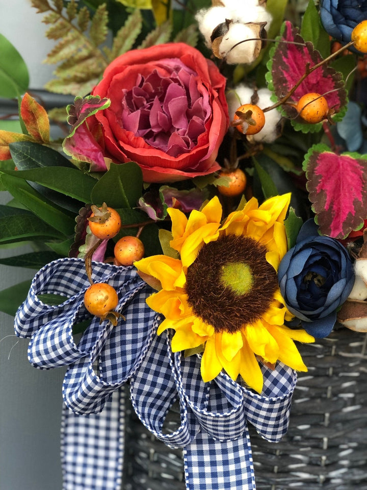 Front door spring basket, with Sunflowers, Ranunculus, Berries, and a Bow