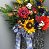 Front door spring basket, with Sunflowers, Ranunculus, Berries, and a Bow