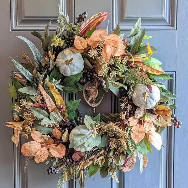 Picture of Eucalyptus and Pumpkin Wreath - 24 inch shown on fronto door