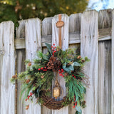 Christmas wreath, Pine wreath with red berries and brass bell. Faux natural looking design for entire winter season. Holiday decorating