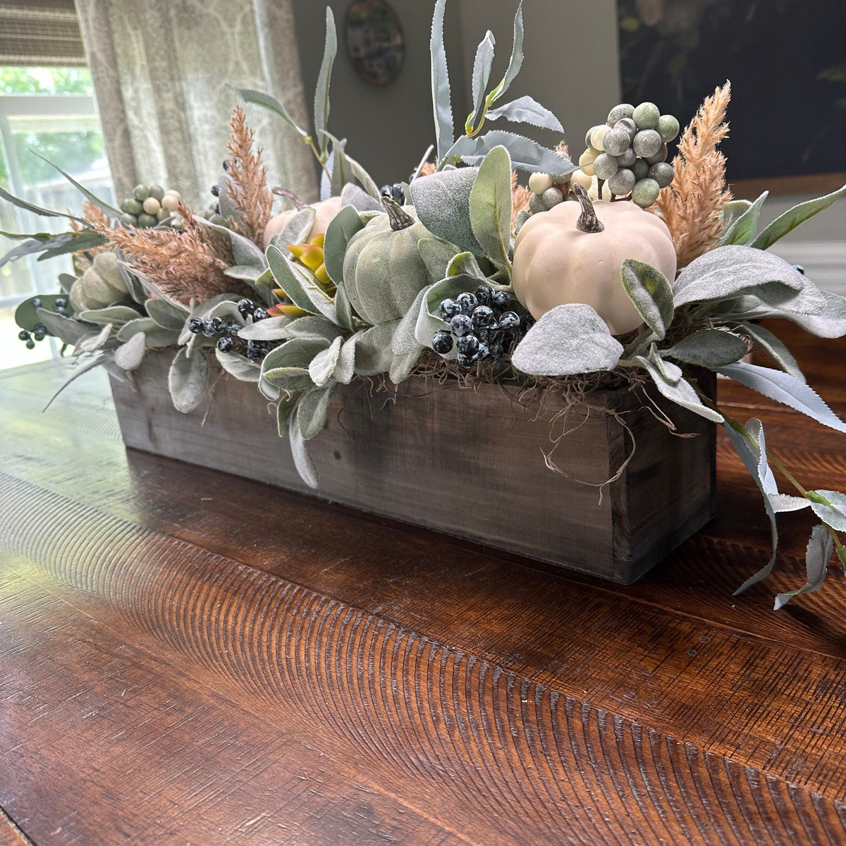 Angle view of Fall lamb’s ear and pumpkin rustic arrangement, Autumn modern farmhouse table top centerpiece, Thanksgiving arrangement, Pumpkin centerpiece