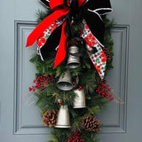 Christmas front door swag with Silver metal bells. Mixed pine with natural pinecones and red berries with twigs topped with a stunning bow!