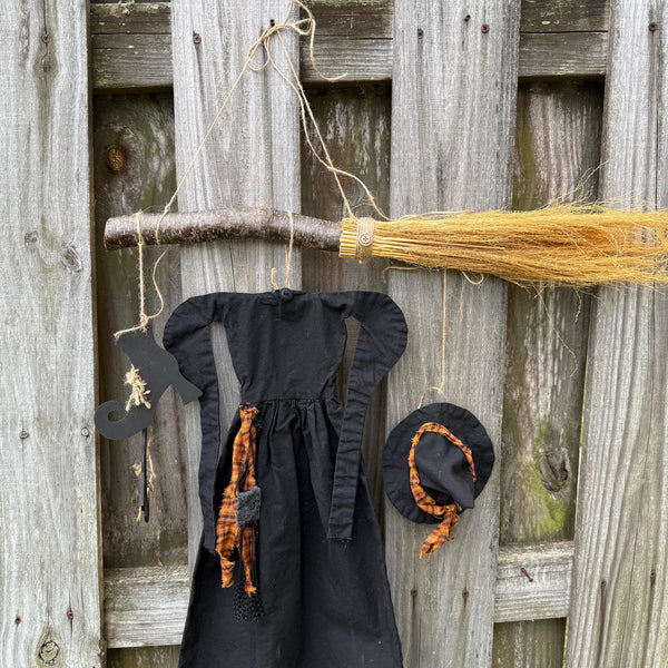 Primitive witch halloween wreath, 22”wide x 24” in length, hand sewn witch outfit hung on her broom, handcrafted witch decor, witchcraft
