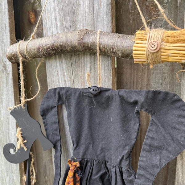 Primitive witch halloween wreath, 22”wide x 24” in length, hand sewn witch outfit hung on her broom, handcrafted witch decor, witchcraft