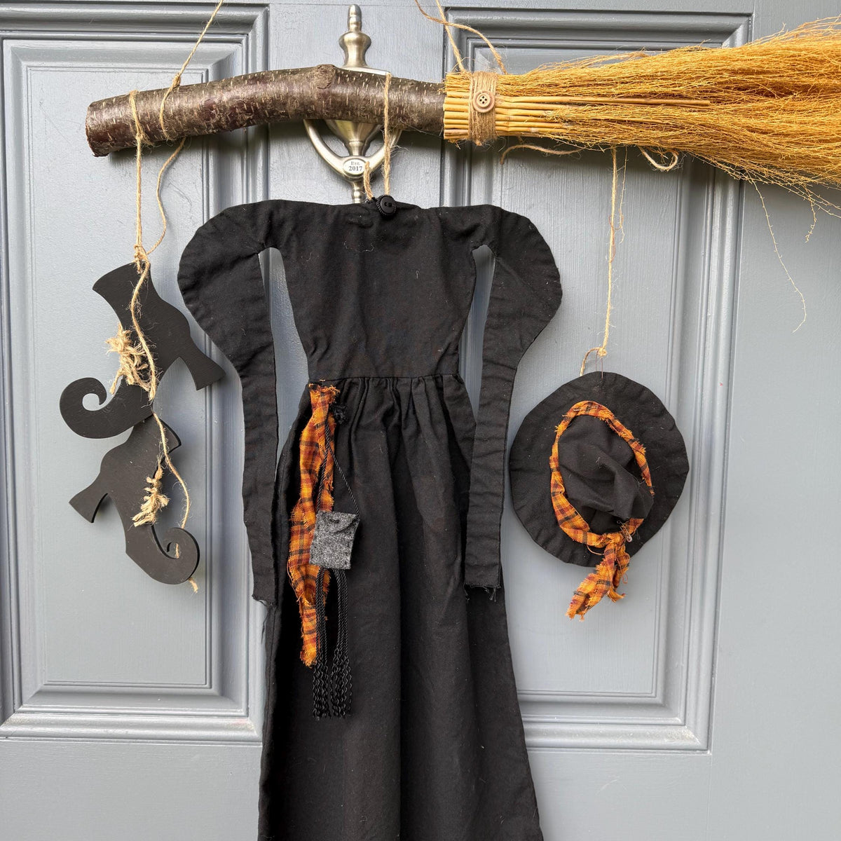 Primitive witch halloween wreath, 22”wide x 24” in length, hand sewn witch outfit hung on her broom, handcrafted witch decor, witchcraft