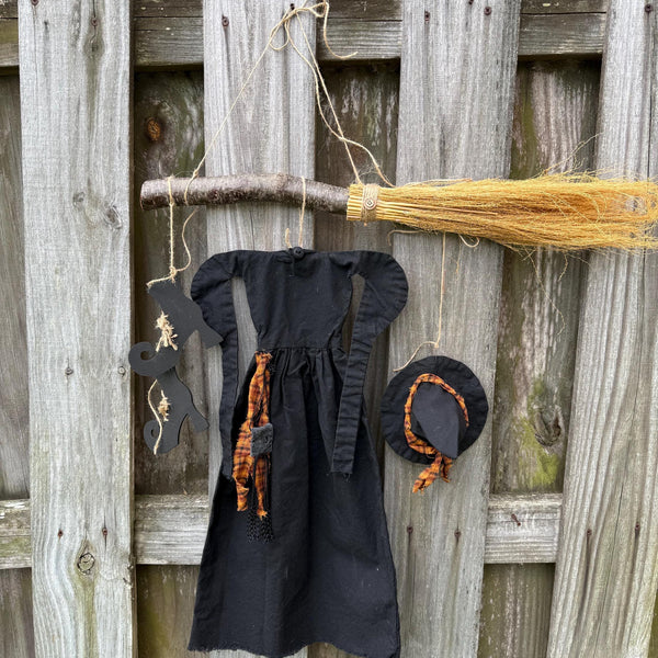 Primitive witch halloween wreath, 22”wide x 24” in length, hand sewn witch outfit hung on her broom, handcrafted witch decor, witchcraft