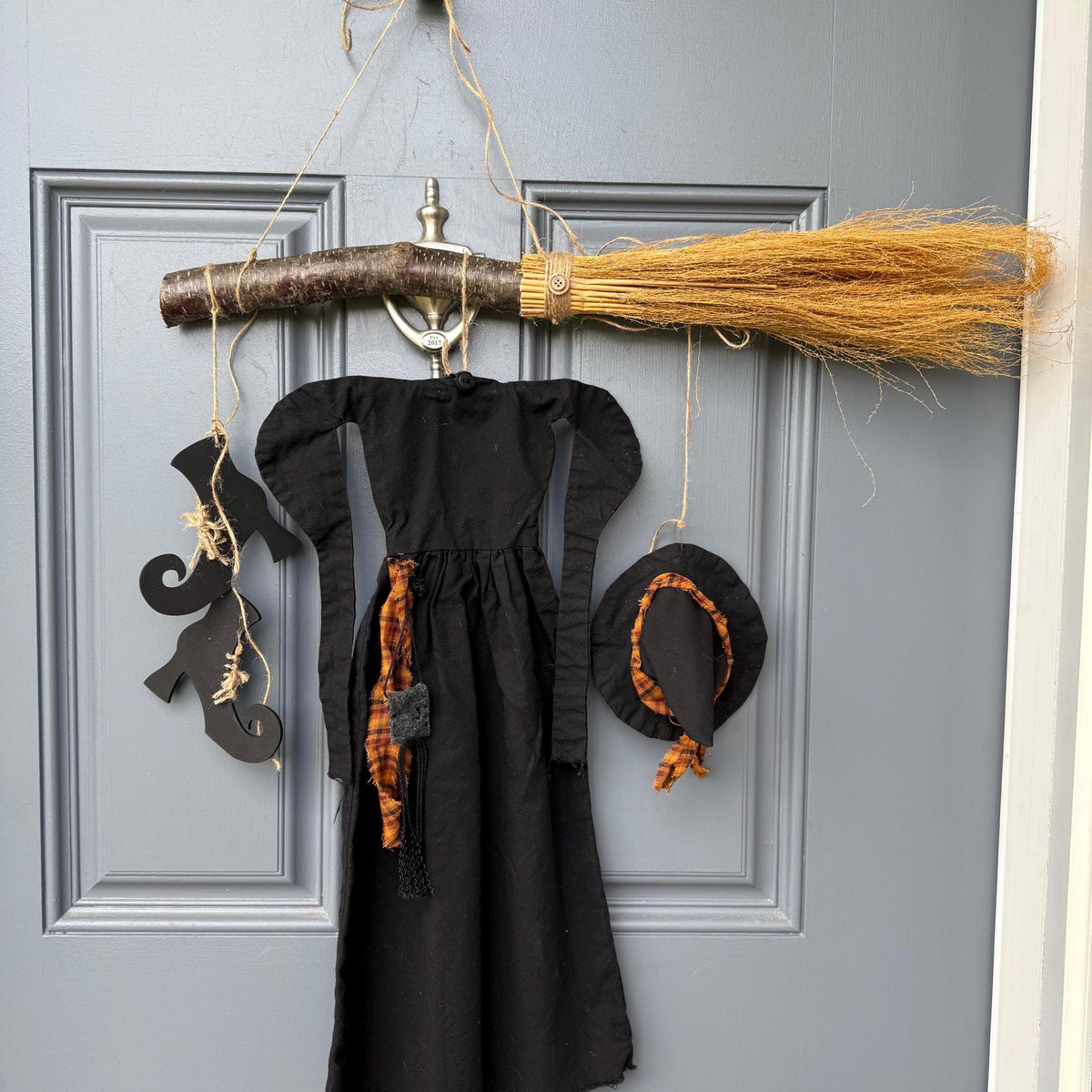 Primitive witch halloween wreath, 22”wide x 24” in length, hand sewn witch outfit hung on her broom, handcrafted witch decor, witchcraft