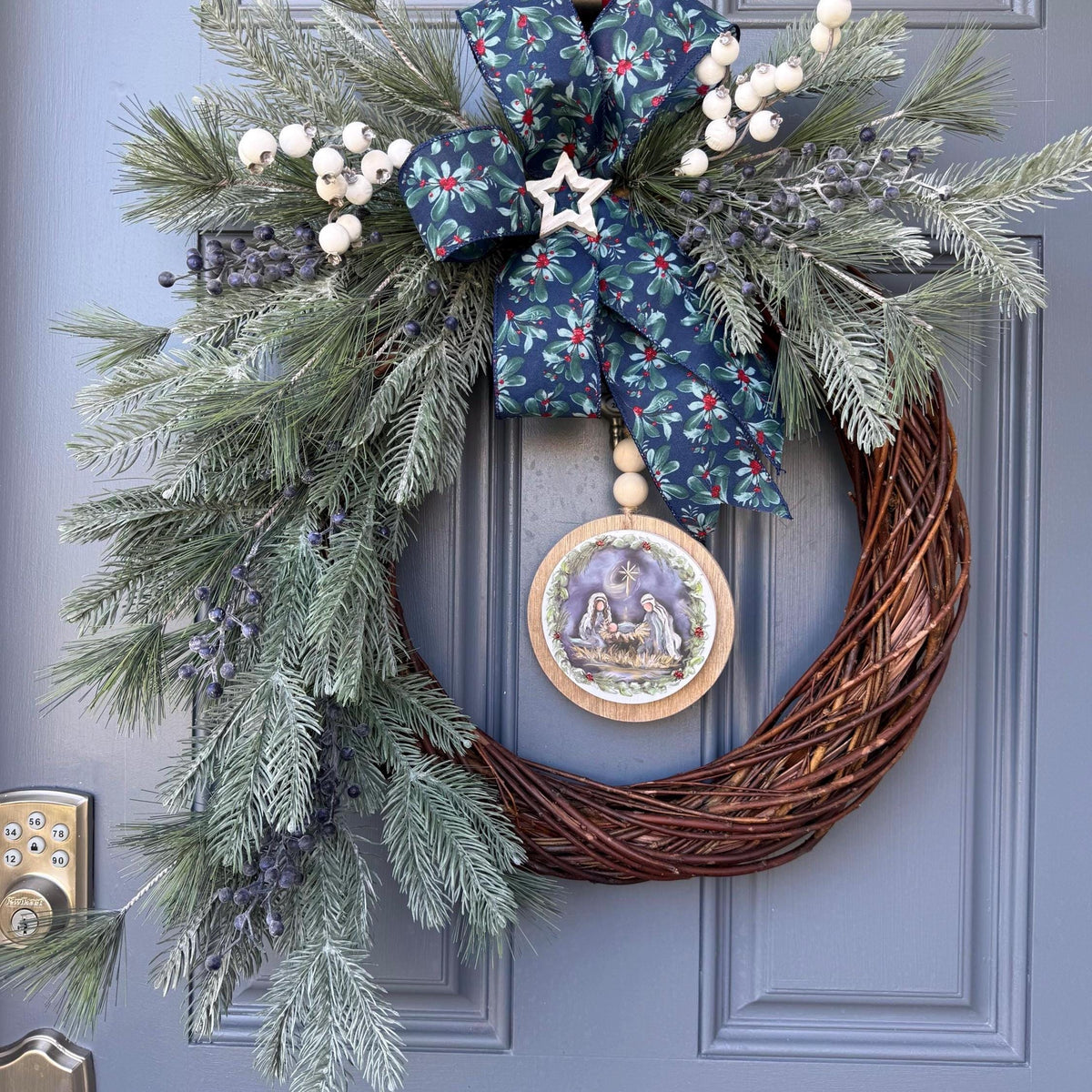 Christmas front door wreath, Religious wreath, Handmade wreath, Front door decor, Painted sign with Jesus, Mary and Joseph in a manger.