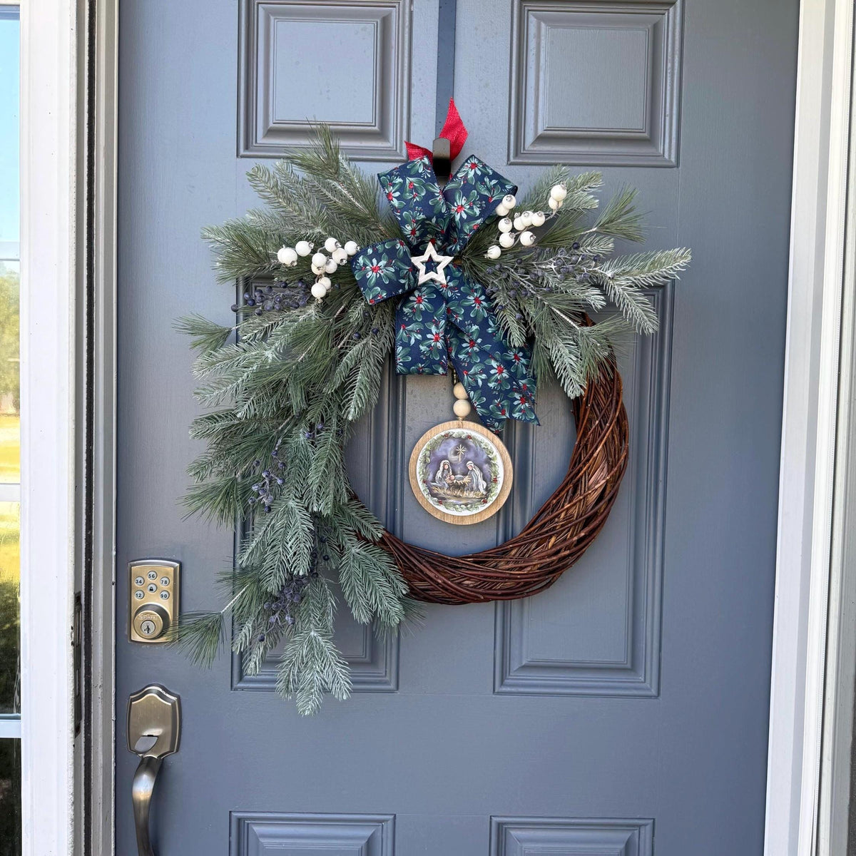 Christmas front door wreath, Religious wreath, Handmade wreath, Front door decor, Painted sign with Jesus, Mary and Joseph in a manger.