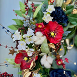 Summer americana wreath for front door, red, white and blue flowers with cotton, and berries for texture. Love the adorable watermelon wedge