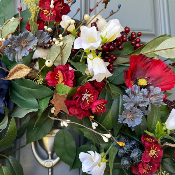 Summer americana wreath for front door, red, white and blue flowers with cotton, and berries for texture. Love the adorable watermelon wedge