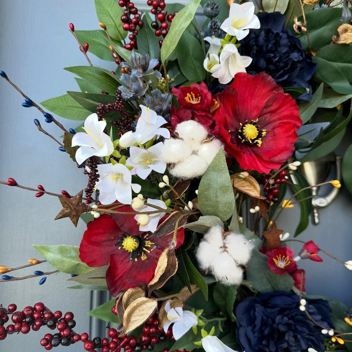 Summer americana wreath for front door, red, white and blue flowers with cotton, and berries for texture. Love the adorable watermelon wedge