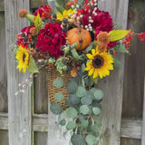 Wreath fall basket filled with autumn flowers