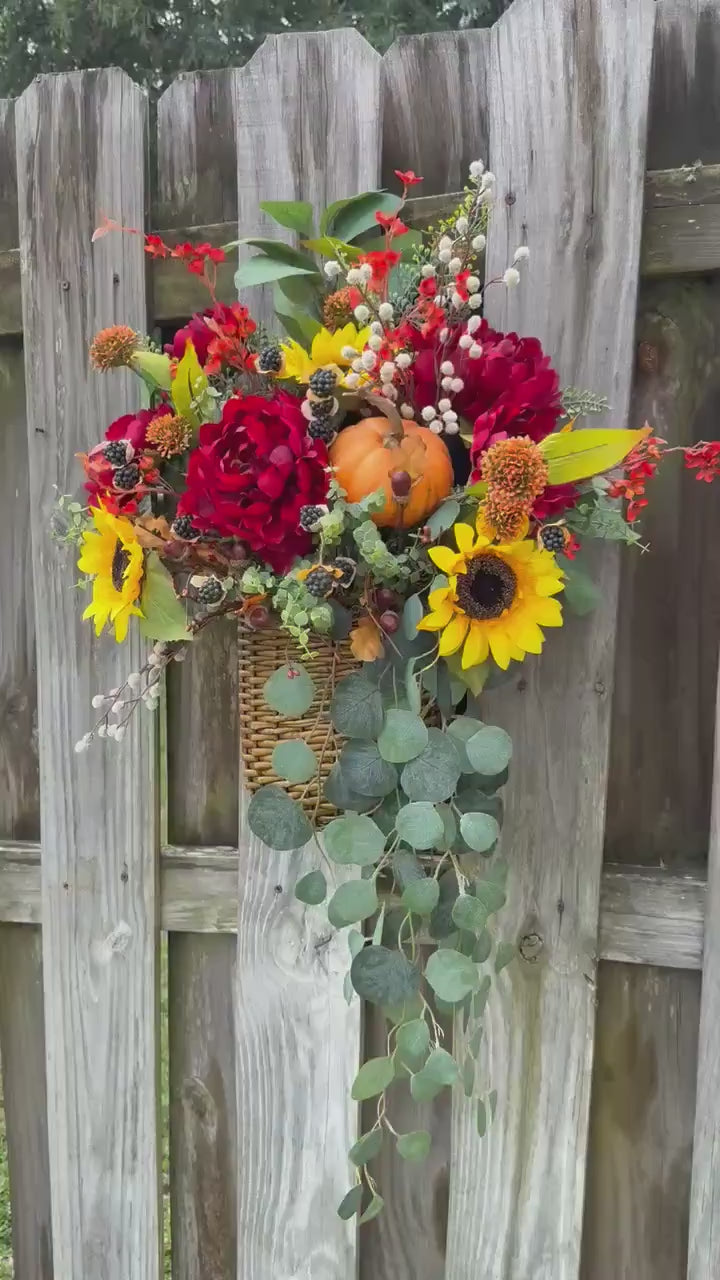 Wreath fall basket filled with autumn flowers