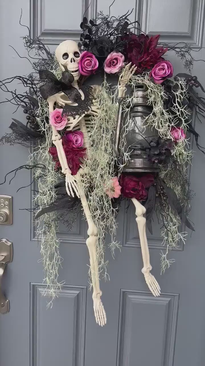 Halloween skeleton door wreath with a lantern that lights up