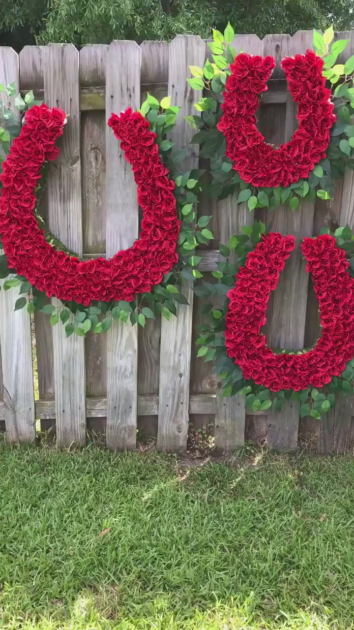 Kentucky Derby Horseshoe Wreath Covered In Red Roses.  Available in 3 sizes 18 inches, 24 inches, and 30 inches.