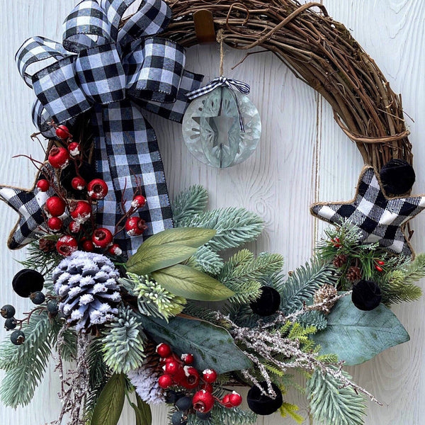 Quaint Country Christmas Wreath Snowy Pine with Buffalo Check Bow and Tin Star Ornament. 22 Inches in Diameter.