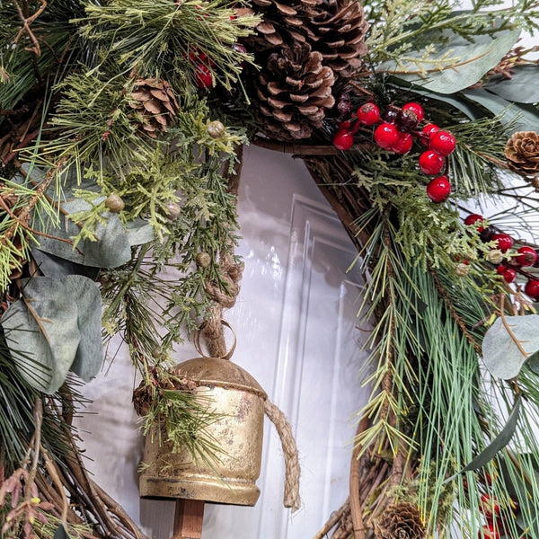 Rustic holiday winter wreath with brass bell. Faux natural wreath for entire season. This quaint wreath is perfect to welcome your guests!