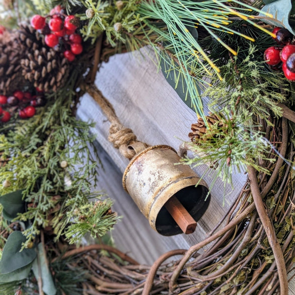 Rustic holiday winter wreath with brass bell. Faux natural wreath for entire season. Available with Red or Blue Berries.